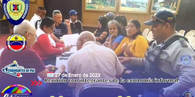 Reunión con integrantes de la economía informal